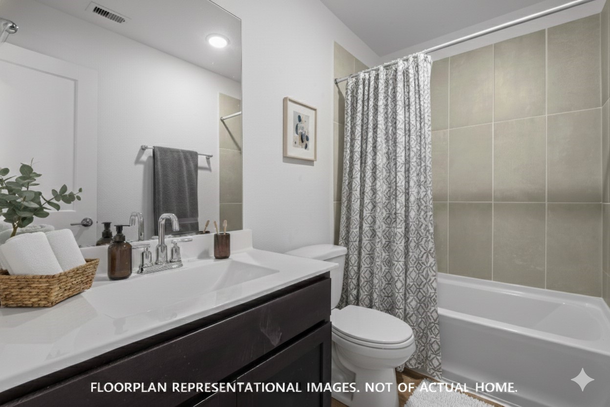 2119 Lone Bronco Boulevard Rosenberg, TX 77471 - Photo 9 of 12 a bathroom with a sink a toilet and shower