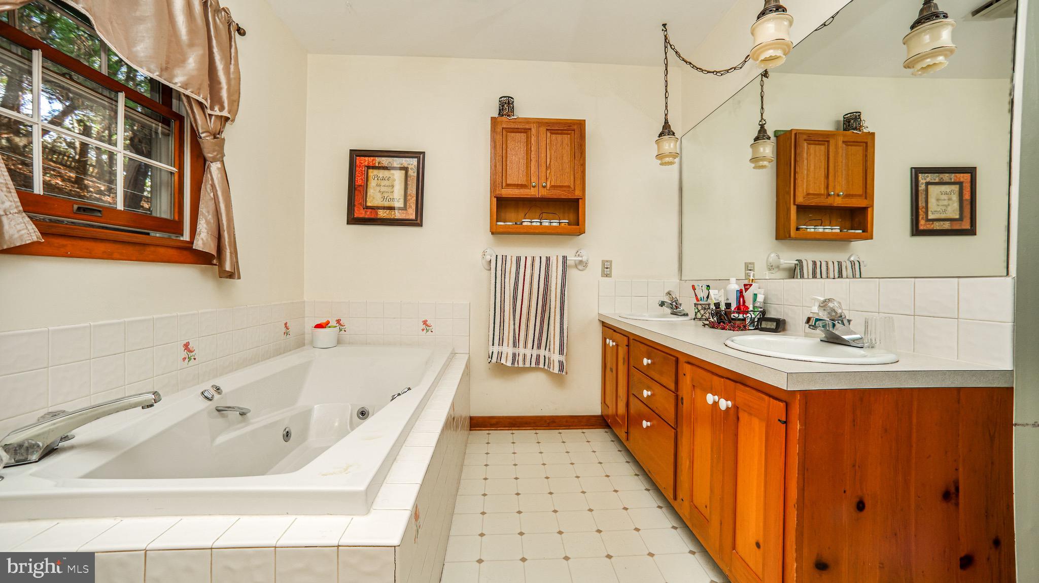 240 Evans Road Lititz, PA 17543 - Photo 17 of 77 a bathroom with sink double vanity