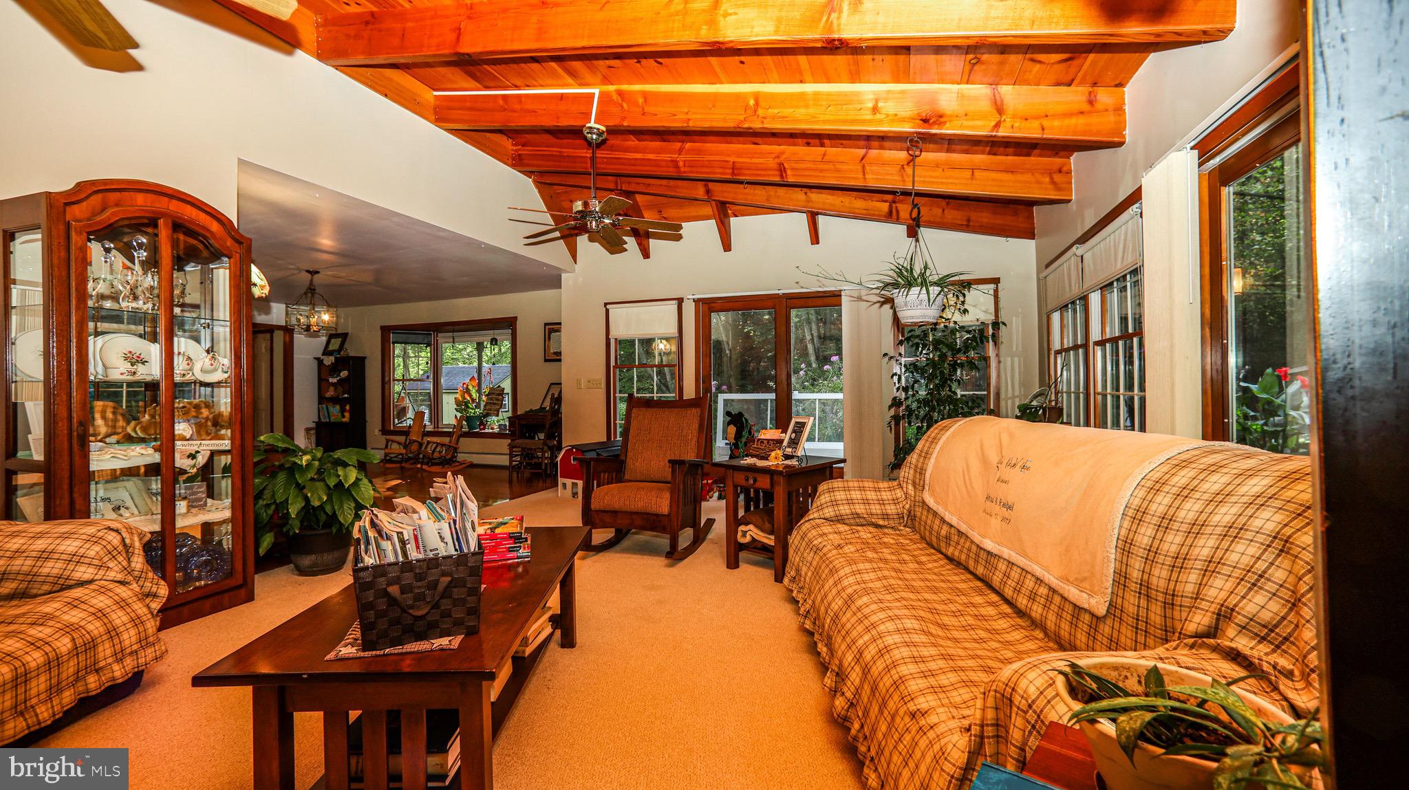 240 Evans Road Lititz, PA 17543 - Photo 19 of 77 a view of a patio with couches table and chairs