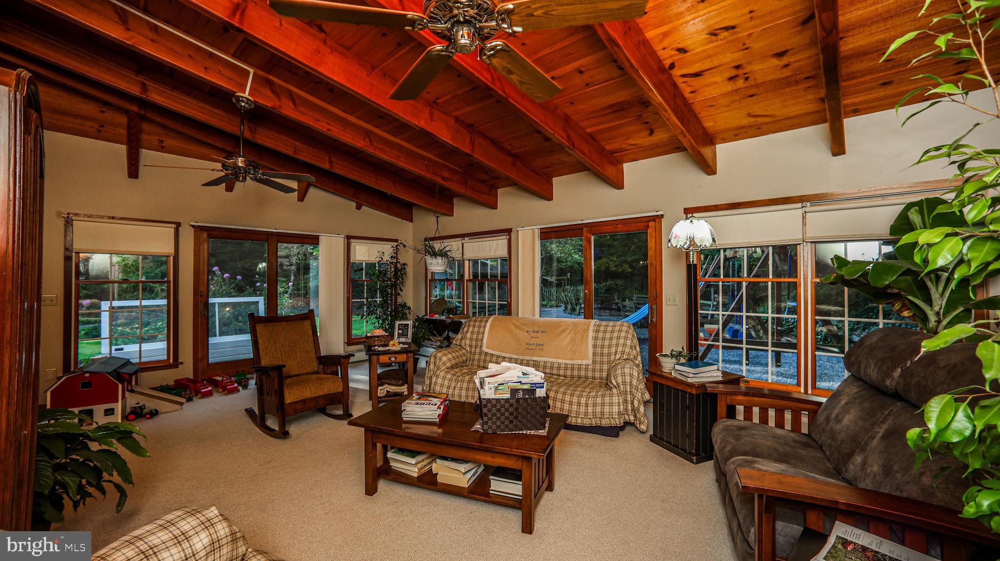 240 Evans Road Lititz, PA 17543 - Photo 20 of 77 a building outdoor space with patio furniture and potted plants