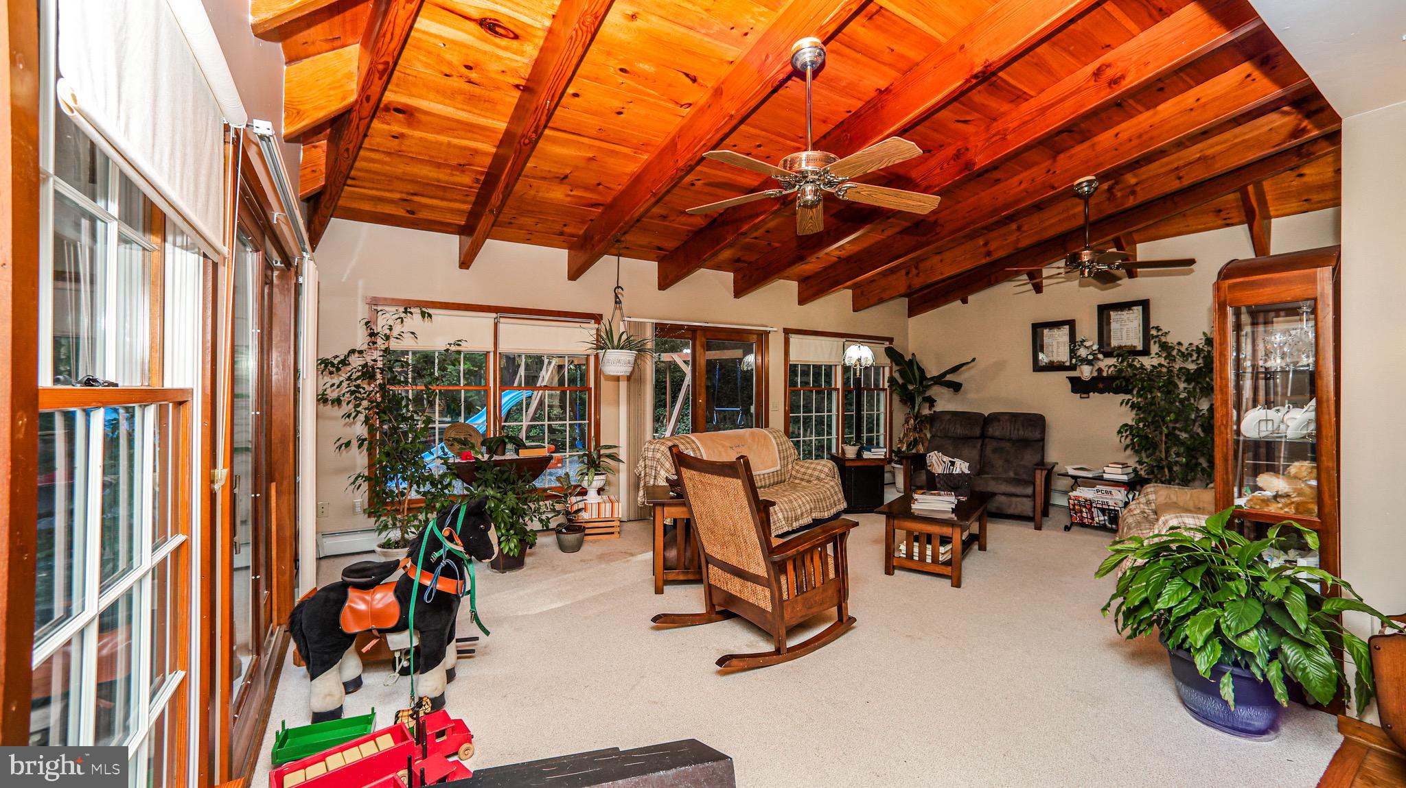 240 Evans Road Lititz, PA 17543 - Photo 21 of 77 a view of a tables and chairs in patio next to a yard
