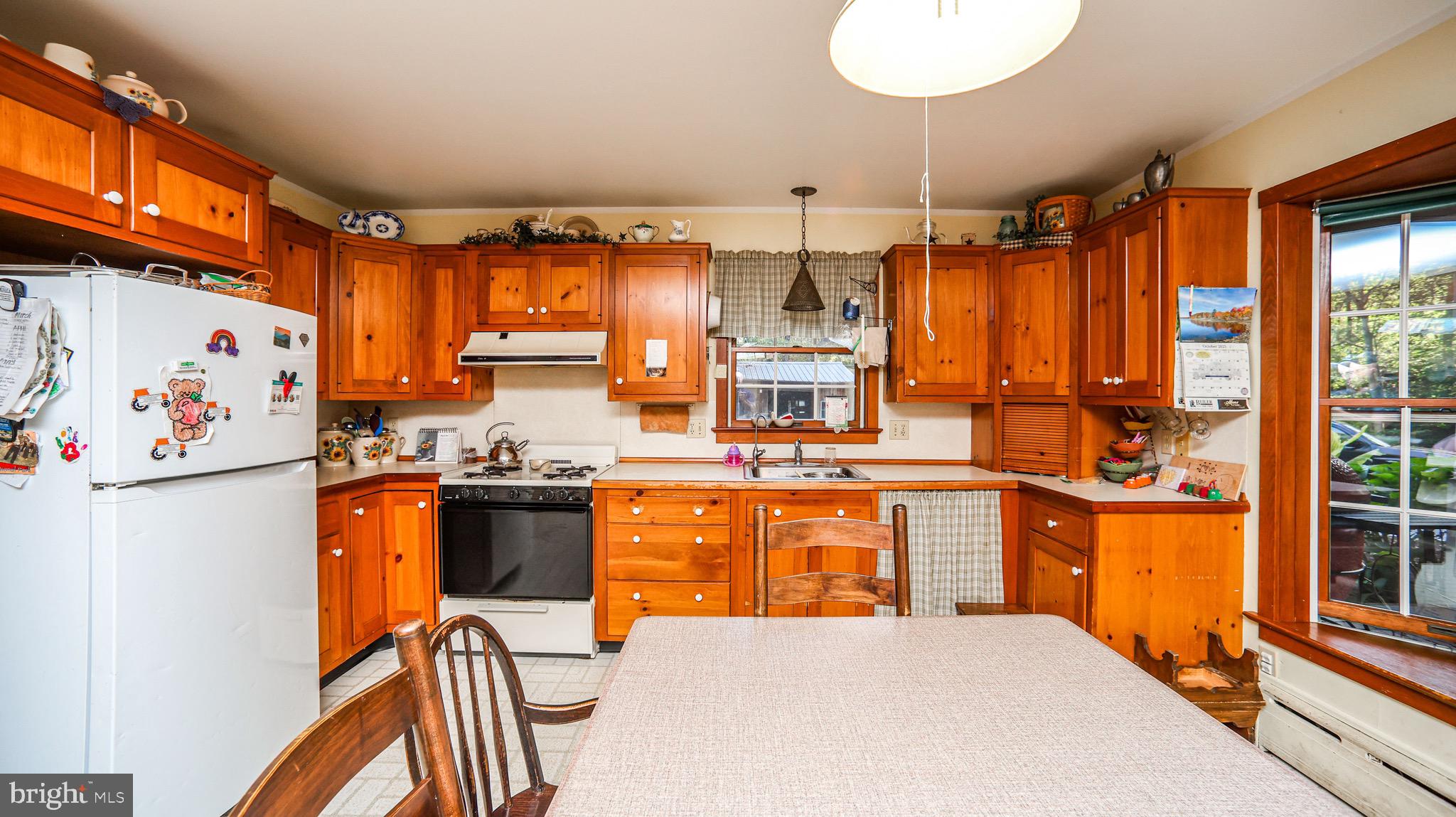 240 Evans Road Lititz, PA 17543 - Photo 3 of 77 a kitchen with stainless steel appliances granite countertop a refrigerator a stove top oven a sink and dishwasher