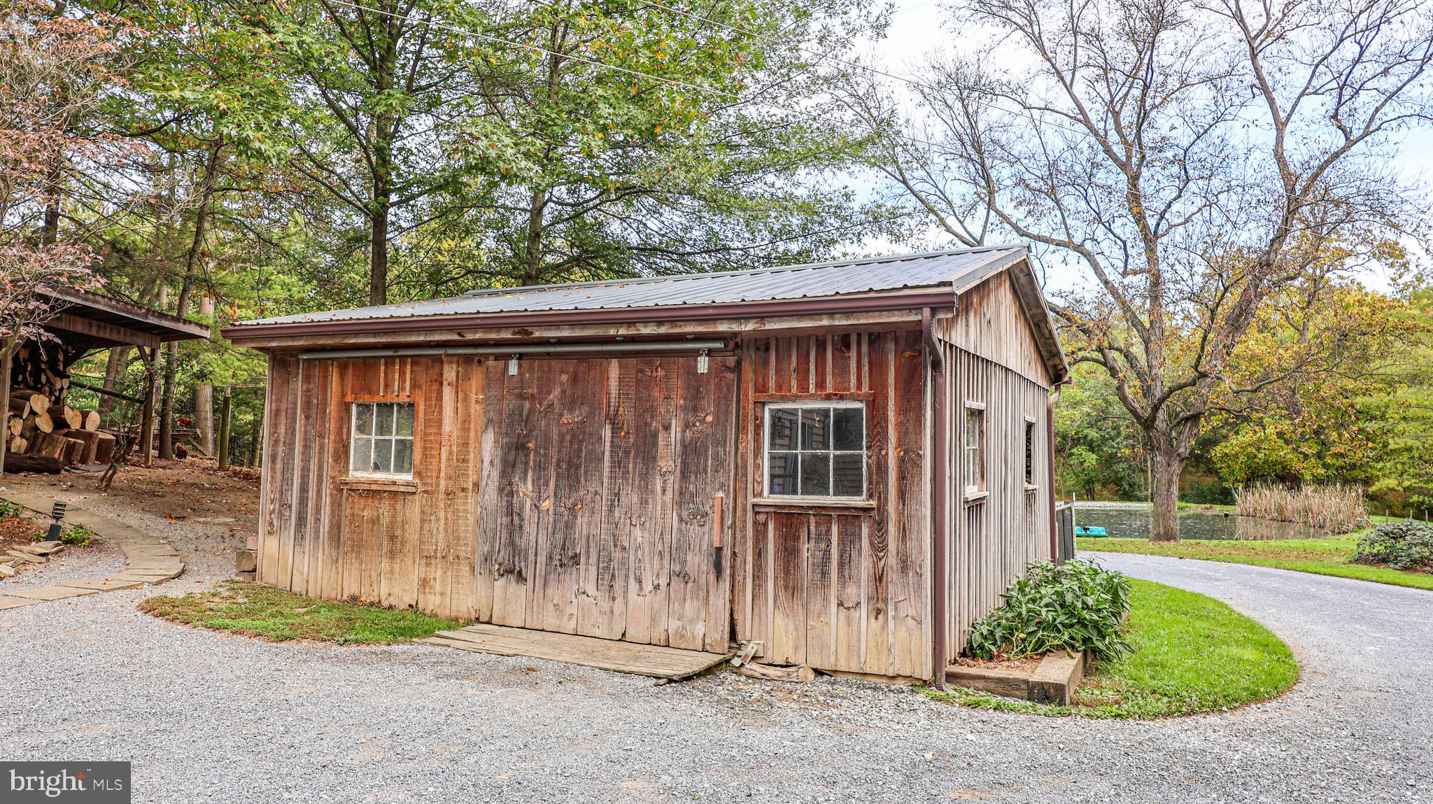 240 Evans Road Lititz, PA 17543 - Photo 33 of 77 a view of a house with a garden