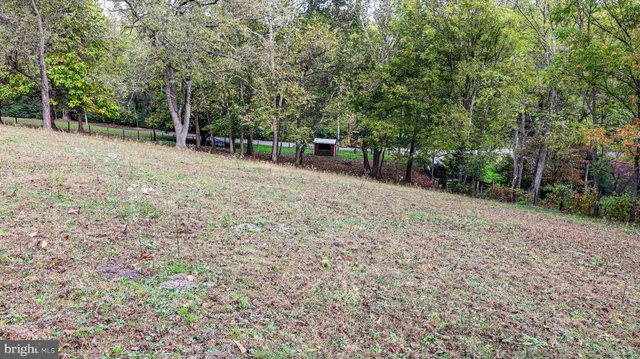 a view of a chairs and table in patio