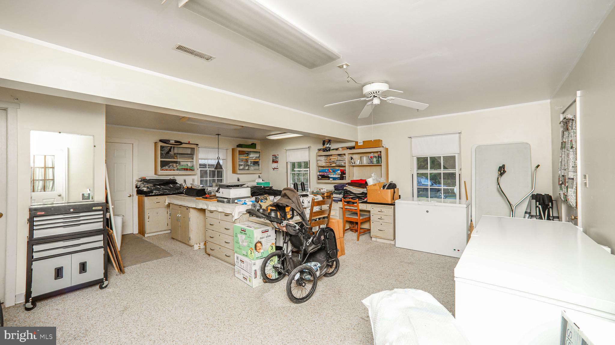 240 Evans Road Lititz, PA 17543 - Photo 44 of 77 a view of a livingroom with furniture and a ceiling fan