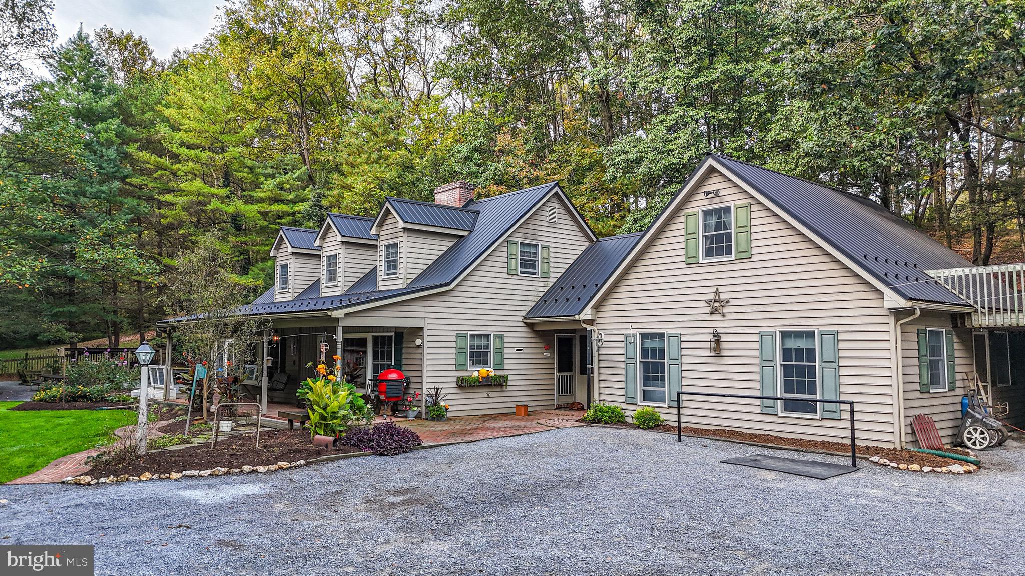 240 Evans Road Lititz, PA 17543 - Photo 60 of 77 a view of a house with a yard and large tree