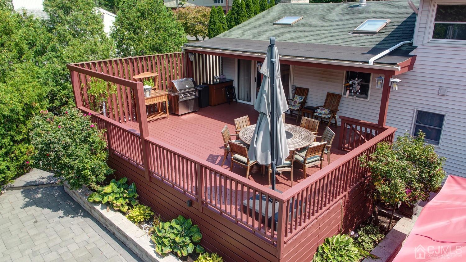 25 Agate Road East Brunswick, NJ 08816 - Photo 36 of 39 a view of balcony with deck and trees