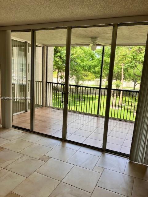 3910 Inverrary Boulevard, Unit 304B Lauderhill, FL 33319 - Photo 15 of 22 a view of an empty room with a balcony