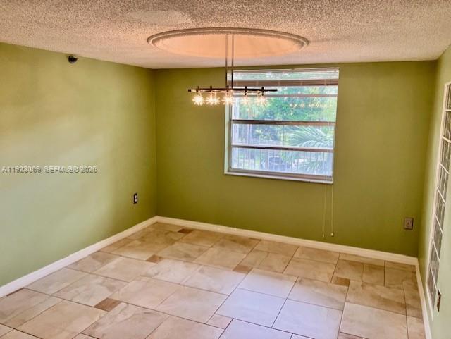 3910 Inverrary Boulevard, Unit 304B Lauderhill, FL 33319 - Photo 8 of 17 a view of a room with window and chandelier