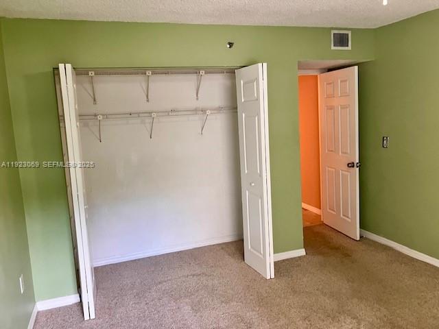 3910 Inverrary Boulevard, Unit 304B Lauderhill, FL 33319 - Photo 9 of 22 a view of a room with closet