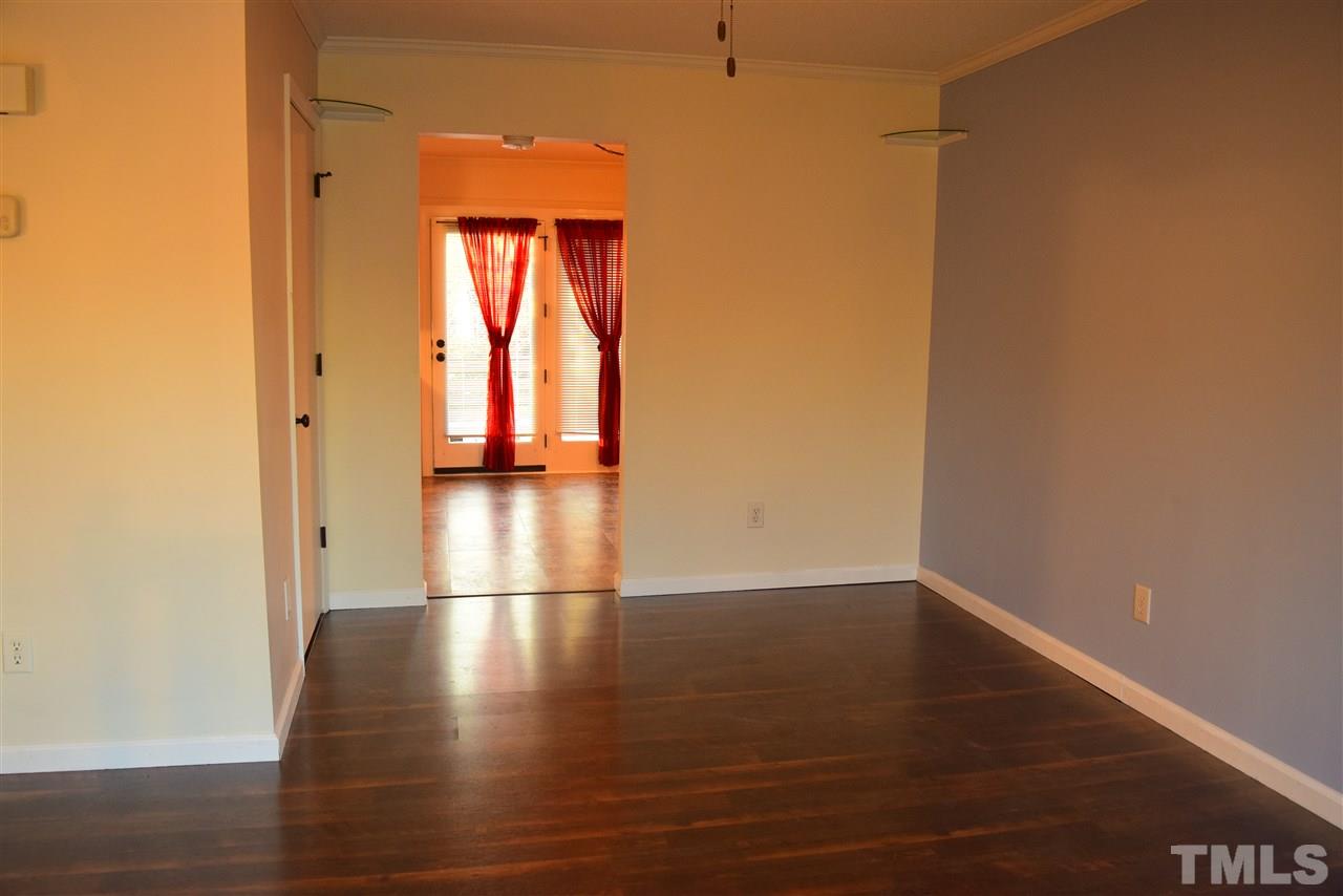 3103 Quinley Place Raleigh, NC 27604 - Photo 12 of 18 a view of a hallway with wooden floor