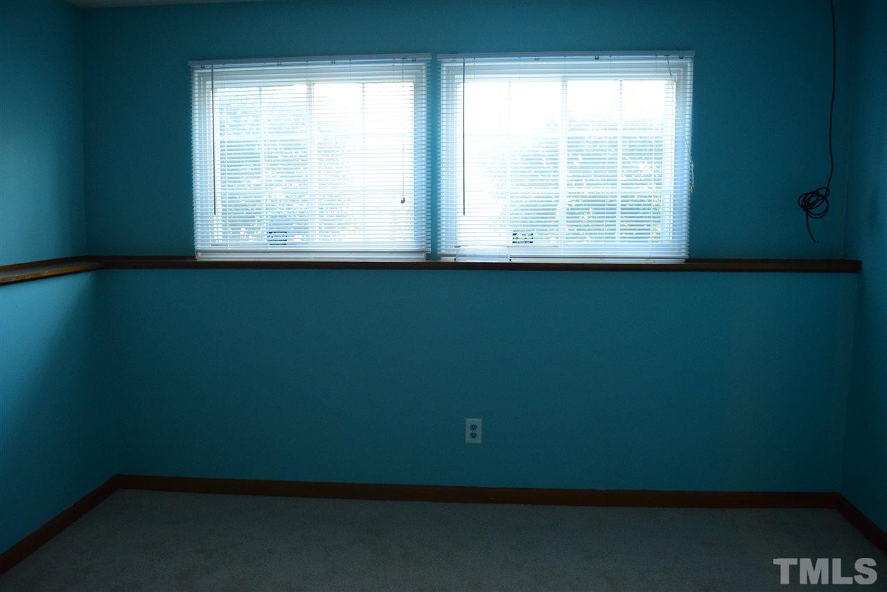 3103 Quinley Place Raleigh, NC 27604 - Photo 13 of 18 a view of a room that has a window in it