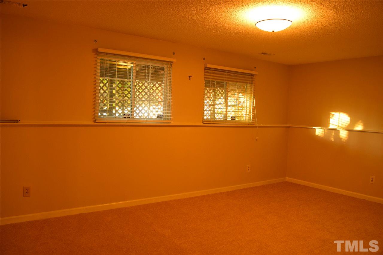 3103 Quinley Place Raleigh, NC 27604 - Photo 17 of 18 a view of empty room with window