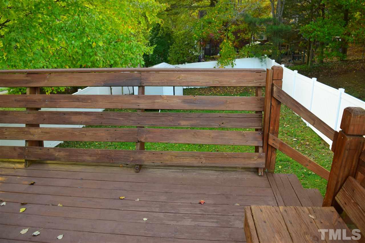 3103 Quinley Place Raleigh, NC 27604 - Photo 3 of 18 a view of a wooden street