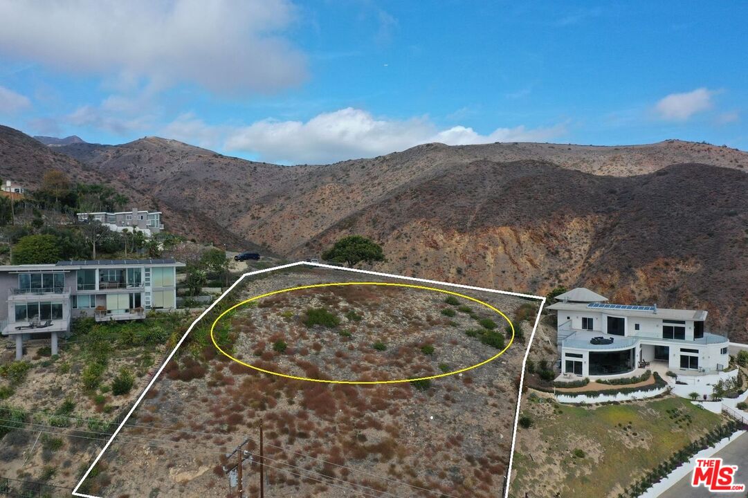 30000 Zenith Point Road Malibu, CA 90265 - Photo 9 of 15 a view of a mountain from a yard
