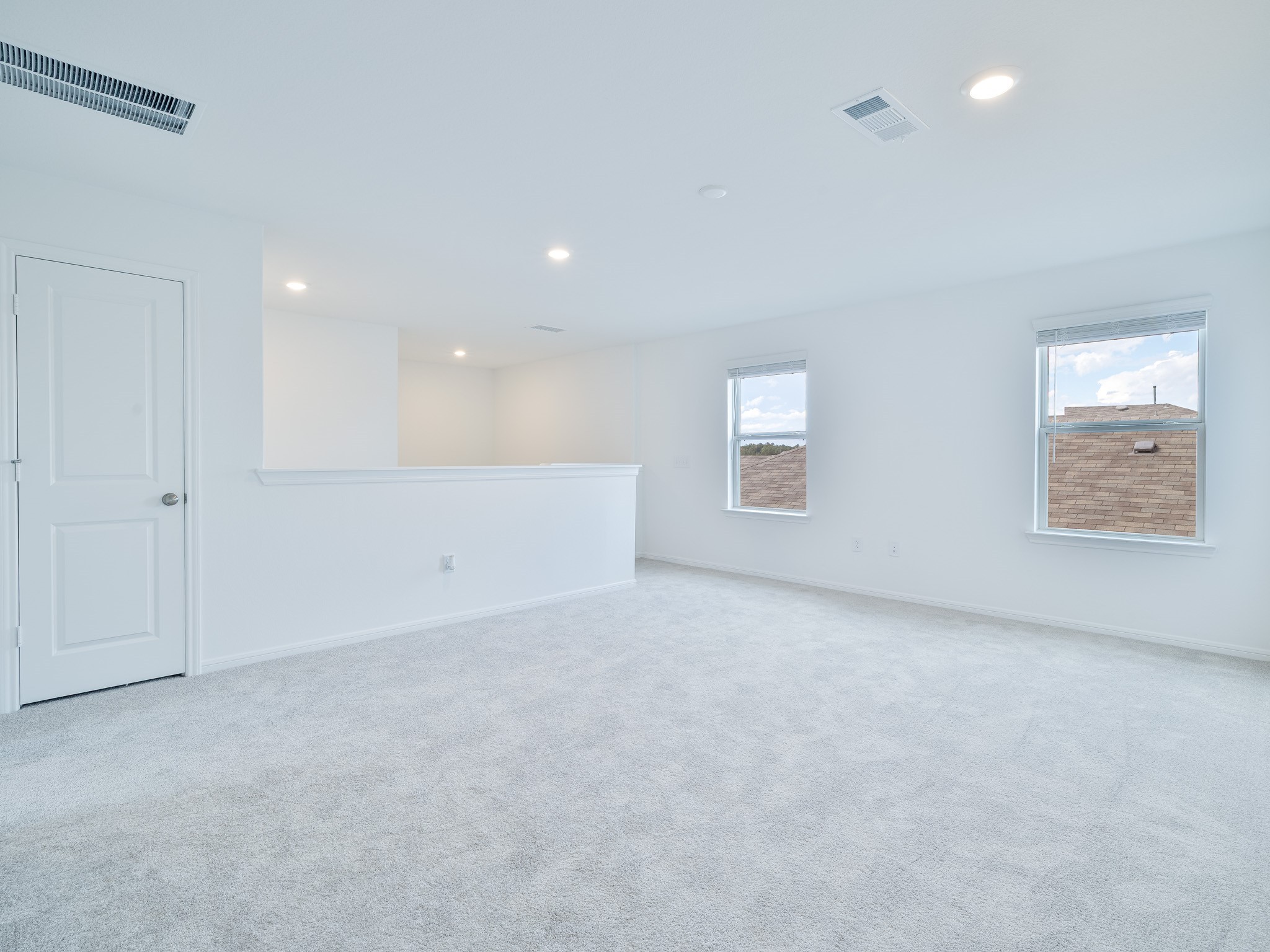 14984 Rustic Moon Road Conroe, TX 77302 - Photo 13 of 20 an empty room with windows and closet