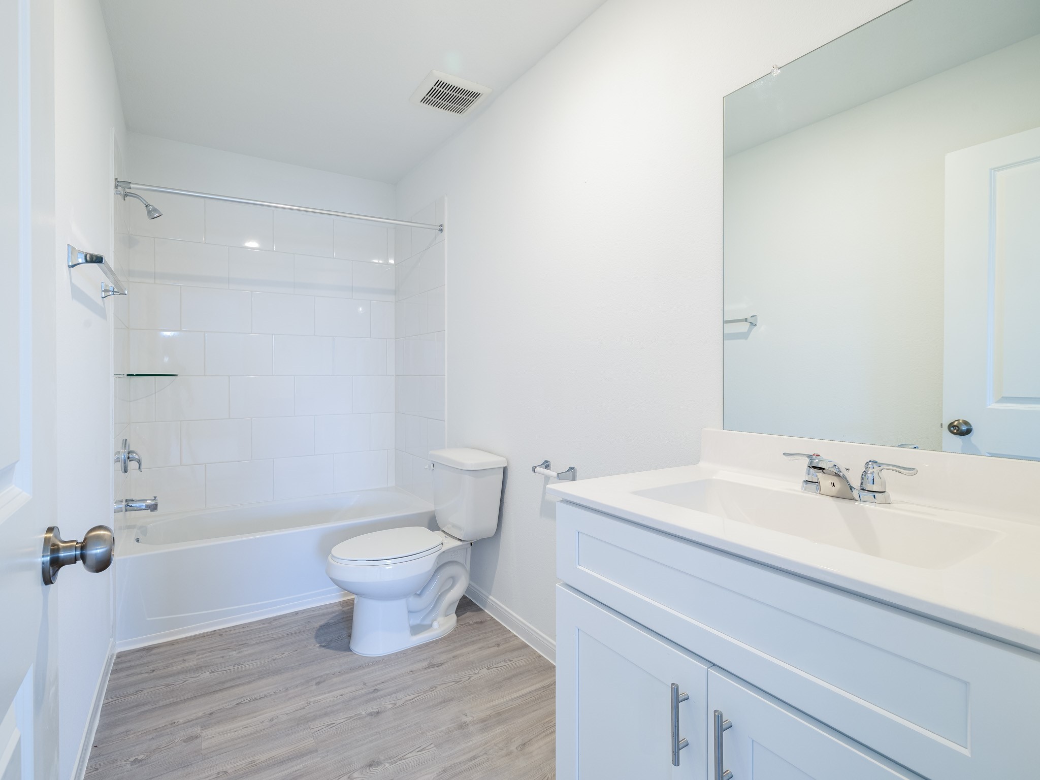 14984 Rustic Moon Road Conroe, TX 77302 - Photo 17 of 20 a bathroom with a sink toilet and a mirror