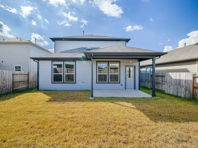 a view of outdoor space with garden and trees