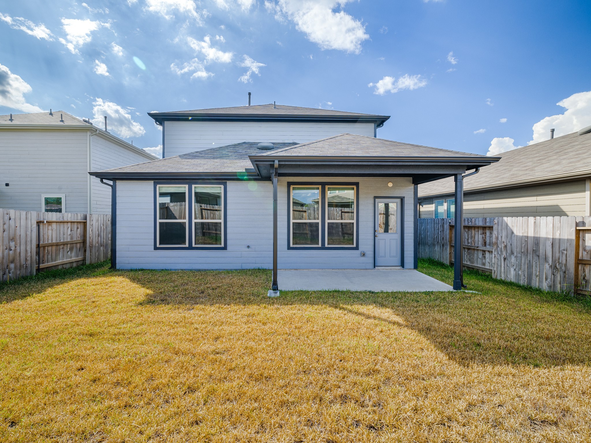 14984 Rustic Moon Road Conroe, TX 77302 - Photo 18 of 20 a view of a house with a yard and porch