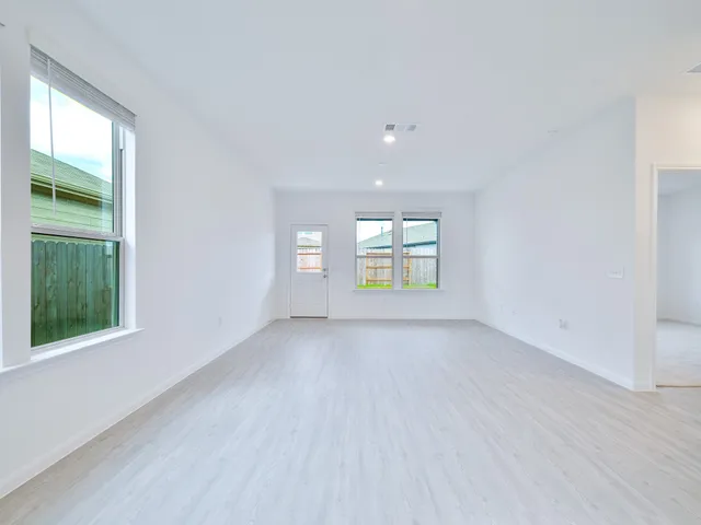 an empty room with windows