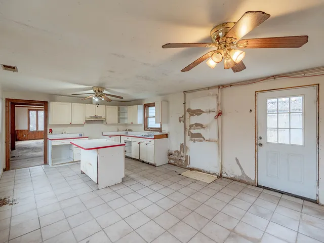 a view of a room and window