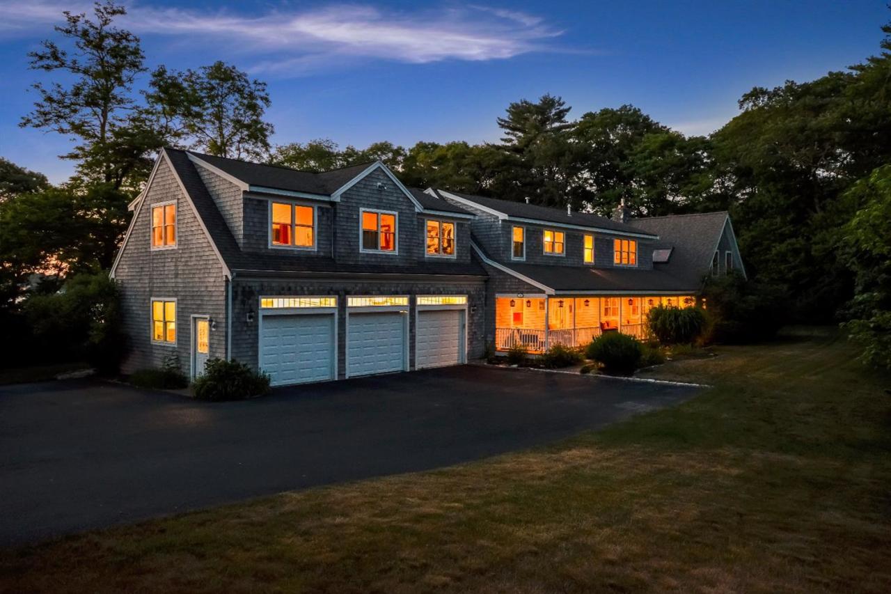 40 Catskill Road Buzzards Bay, MA 02532 - Photo 1 of 35 a front view of a house with a yard