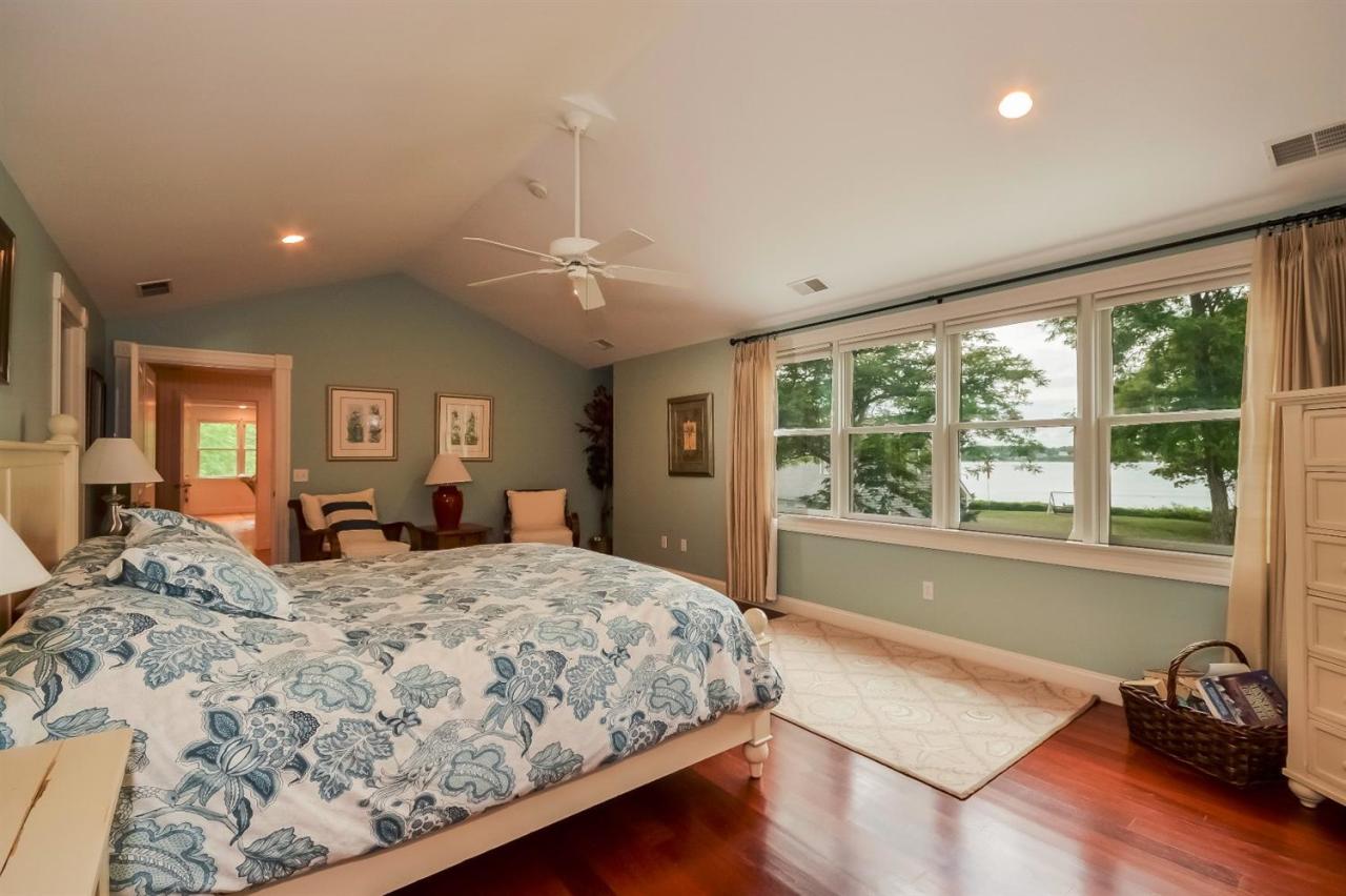 40 Catskill Road Buzzards Bay, MA 02532 - Photo 20 of 35 a bedroom with a large bed and a window