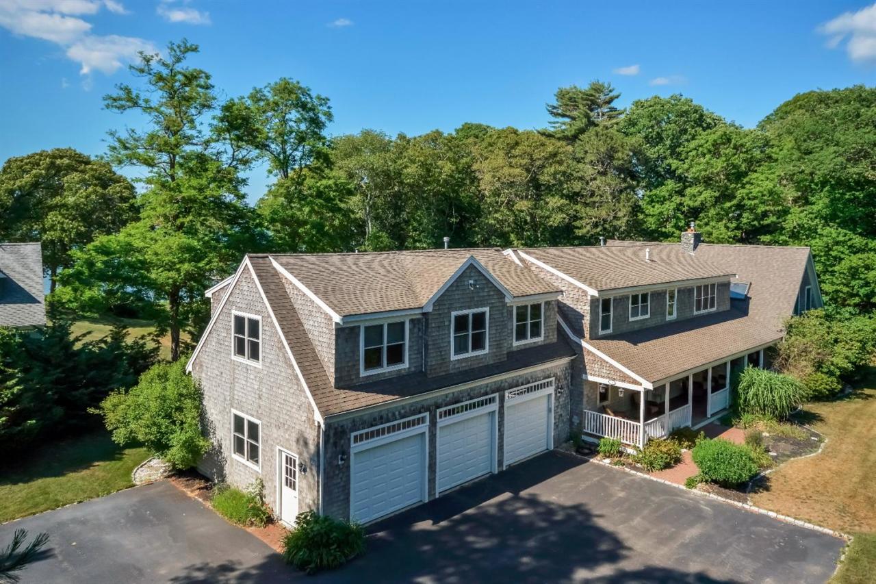 40 Catskill Road Buzzards Bay, MA 02532 - Photo 2 of 35 an aerial view of residential houses with yard and trees in the background