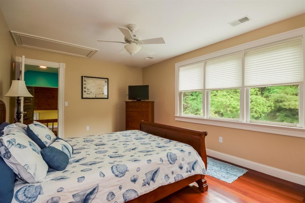 40 Catskill Road Buzzards Bay, MA 02532 - Photo 22 of 35 a bedroom with a bed and a window