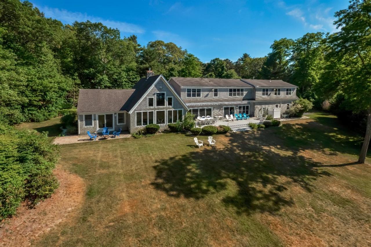 40 Catskill Road Buzzards Bay, MA 02532 - Photo 4 of 35 a front view of a house with a yard