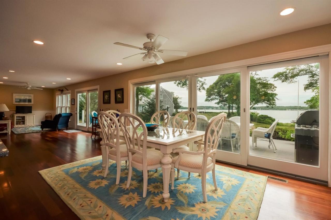 40 Catskill Road Buzzards Bay, MA 02532 - Photo 10 of 35 a view of a dining room with furniture window and wooden floor