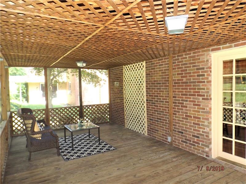 115 Spring Grove Road Penn Hills, PA 15235 - Photo 11 of 25 24x12 Rear Covered screened in deck area .