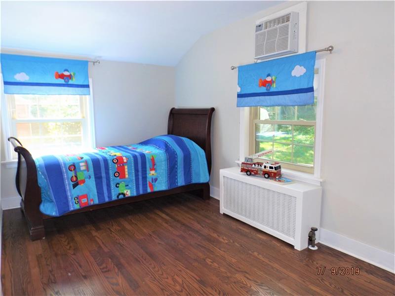115 Spring Grove Road Penn Hills, PA 15235 - Photo 16 of 25 2nd Bedroom with Hardwood floor.