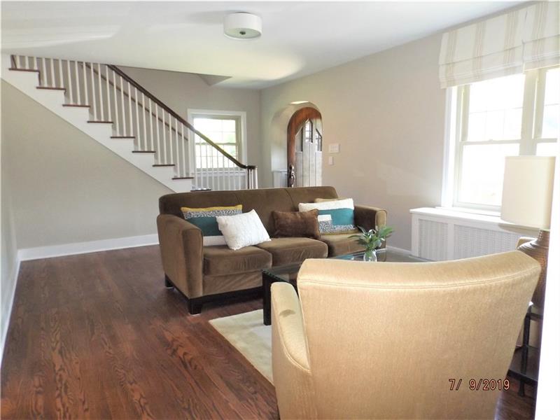 115 Spring Grove Road Penn Hills, PA 15235 - Photo 6 of 25 Updated Living Room with Hardwood Floor.