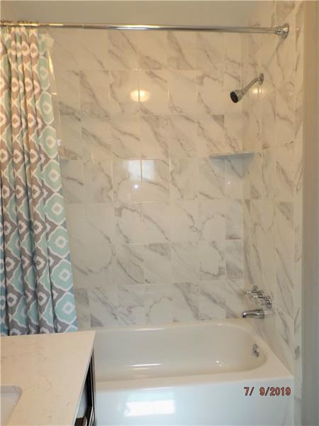 115 Spring Grove Road Penn Hills, PA 15235 - Photo 9 of 25 Updated 1st floor Full bath.