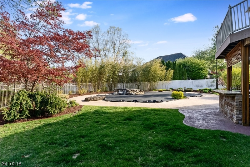 1 Brodziak Road Denville, NJ 07834 - Photo 34 of 42 a view of a backyard with sitting area