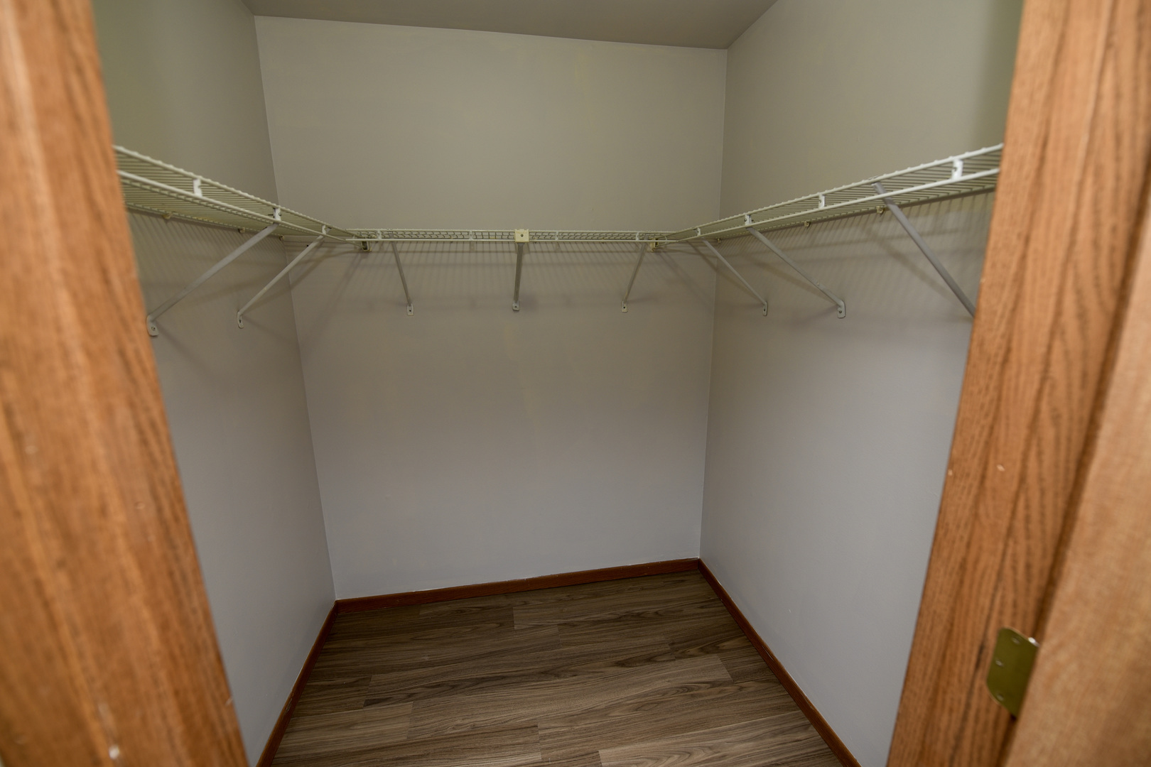 59 Gant Circle, Unit F Streamwood, IL 60107 - Photo 12 of 18 a view of an empty walk in closet