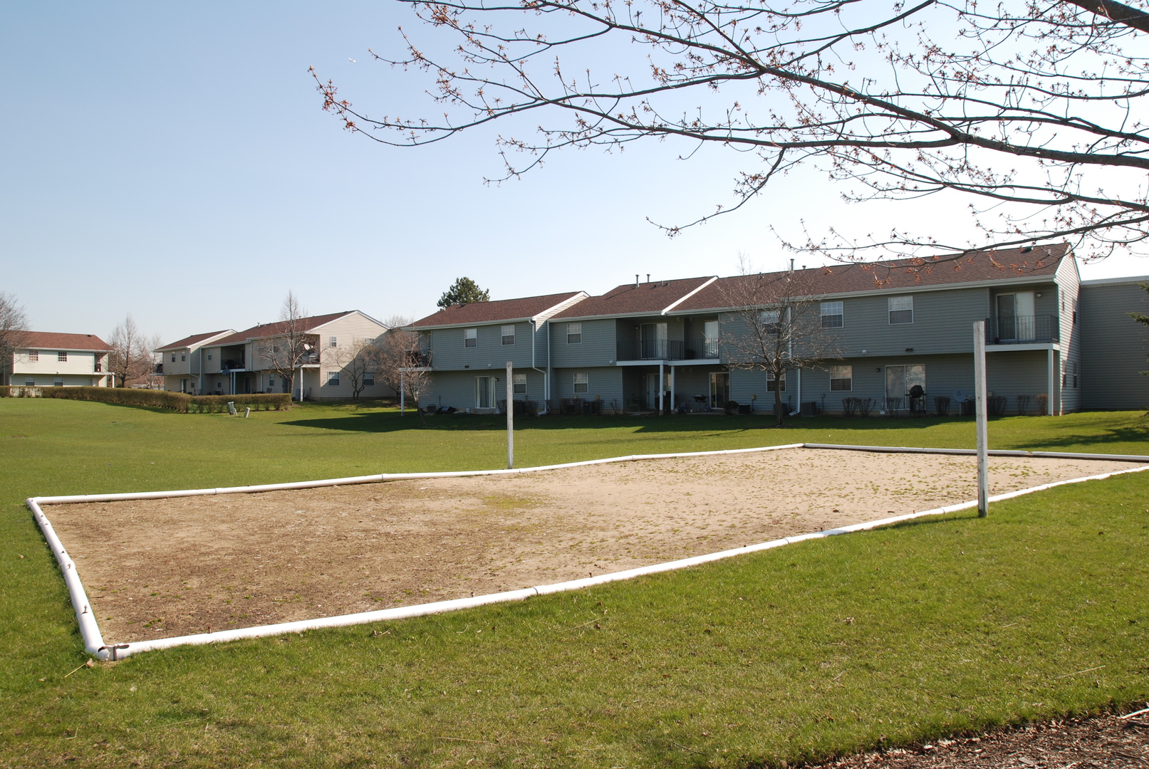59 Gant Circle, Unit F Streamwood, IL 60107 - Photo 15 of 18 a view of yard with swimming pool and green space