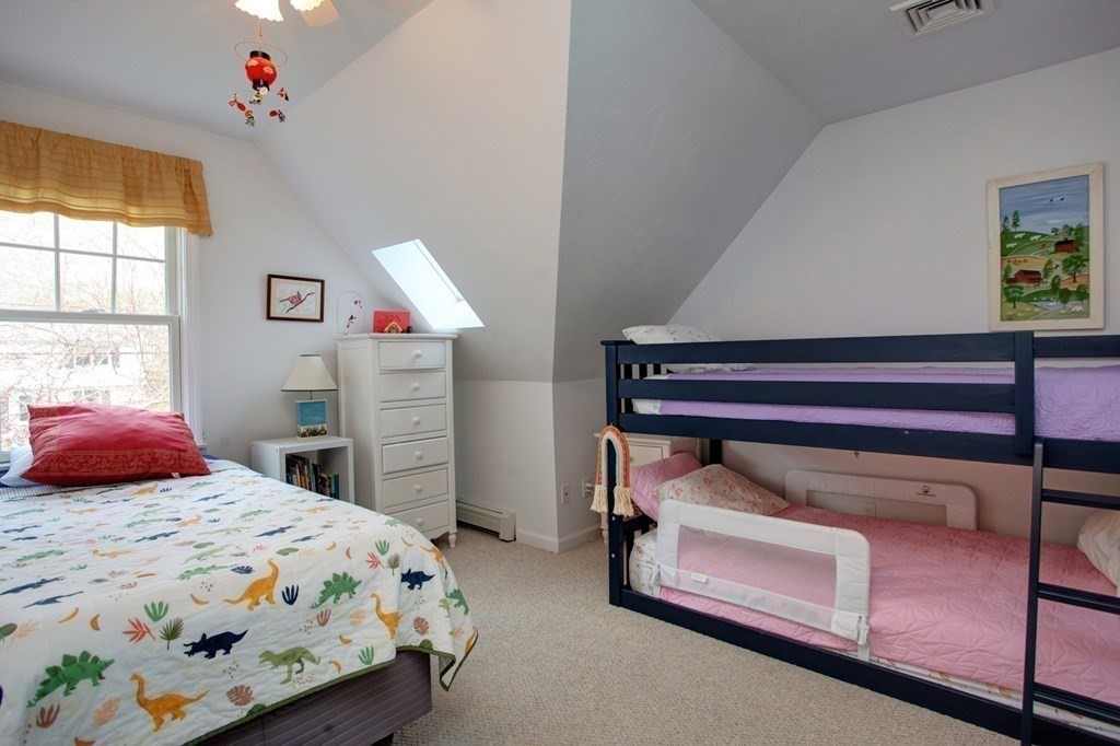 55 Pond Circle Mashpee, MA 02649 - Photo 15 of 40 a bedroom with a bed and a closet