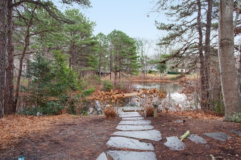 55 Pond Circle Mashpee, MA 02649 - Photo 33 of 40 a view of a lake with lots of trees