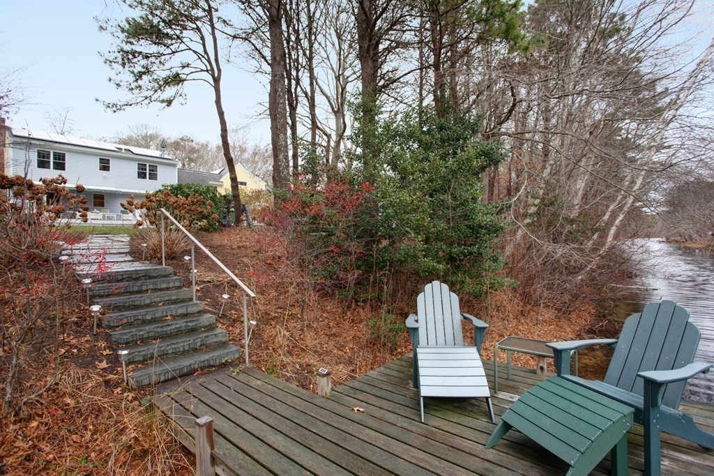 55 Pond Circle Mashpee, MA 02649 - Photo 35 of 40 a view of outdoor space with seating