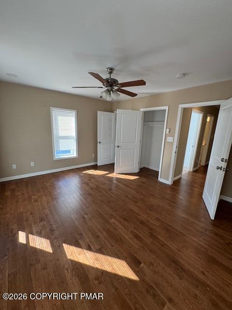 106 Ridgeway Street East Stroudsburg, PA 18301 - Photo 3 of 8 a view of an empty room with wooden floor and a ceiling fan