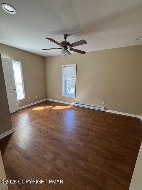 106 Ridgeway Street East Stroudsburg, PA 18301 - Photo 7 of 8 an empty room with wooden floor and windows