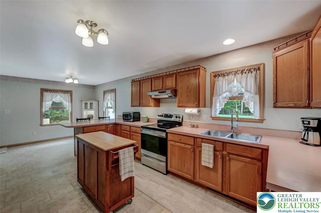 187 Wellington Road Stroudsburg, PA 18360 - Photo 19 of 58 Kitchen w/ Backyard View