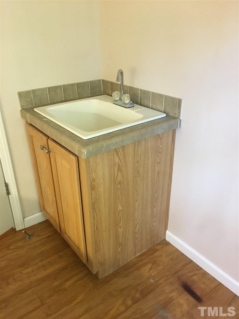 41 Ridge View Drive Cameron, NC 28326 - Photo 13 of 24 Laundry room has built in sink