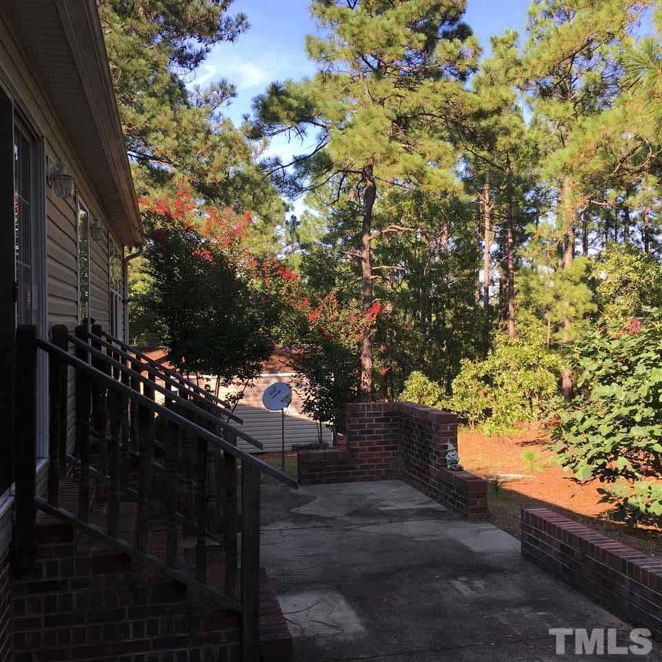 41 Ridge View Drive Cameron, NC 28326 - Photo 4 of 24 Relax on the concrete patio