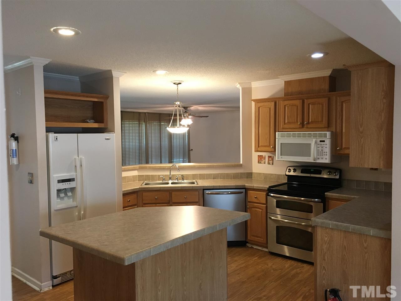 41 Ridge View Drive Cameron, NC 28326 - Photo 9 of 24 Large Kitchen with island and plenty of cabinets.