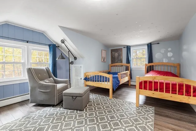 a living room with furniture and windows