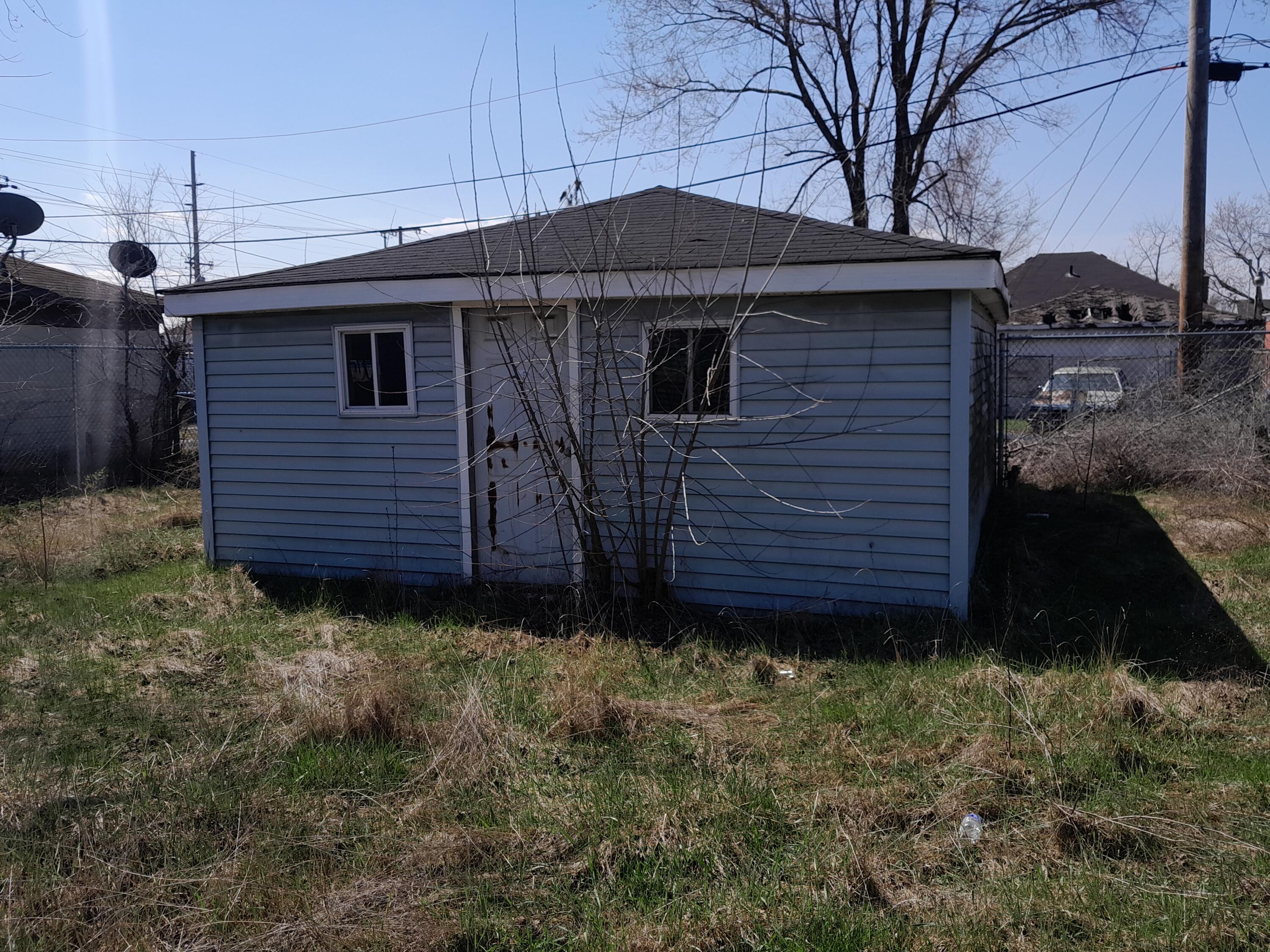 266 Johnson Street Gary, IN 46404 - Photo 3 of 16 a view of a backyard