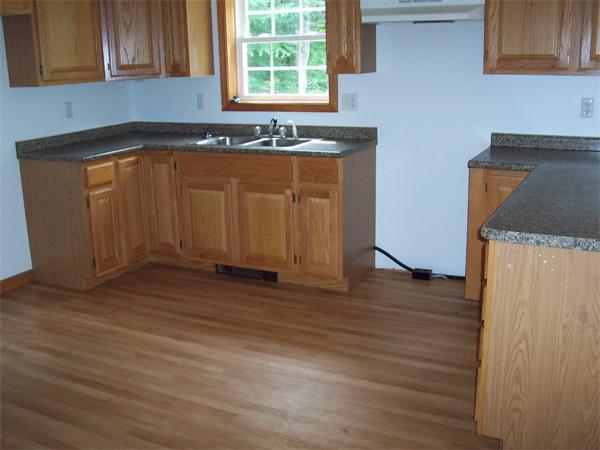 475 Riceville Road Athol, MA 01331 - Photo 4 of 9 a view of a kitchen with wooden floor and a sink